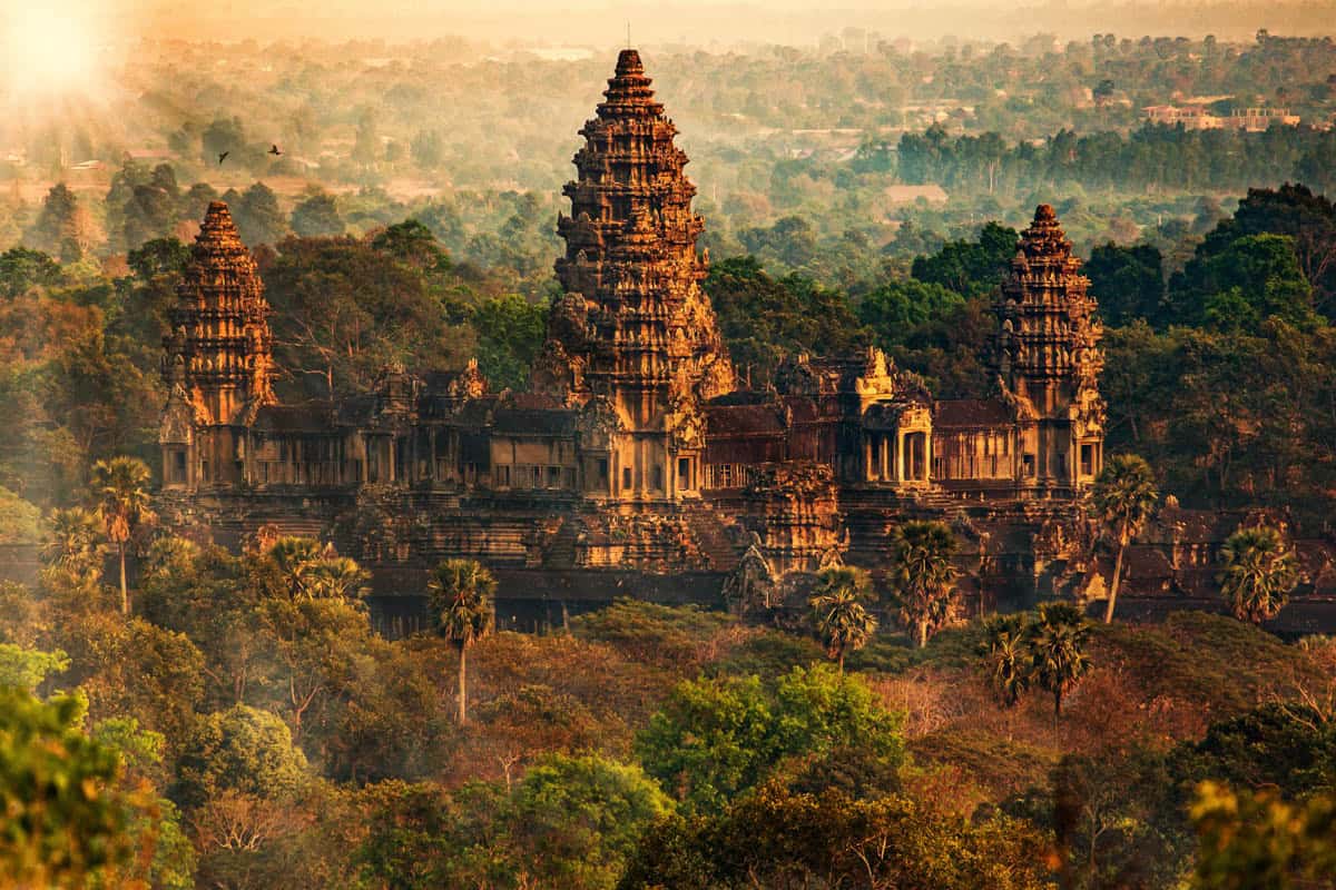 Tree canopy and hazy horizon beside Angkor Wat above the Forest in Siem Reap, Cambodia.